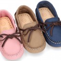 Nobuck leather Moccasin shoes with contraste bows for little kids.