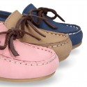 Nobuck leather Moccasin shoes with contraste bows for little kids.