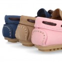 Nobuck leather Moccasin shoes with contraste bows for little kids.