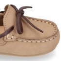 Nobuck leather Moccasin shoes with contraste bows for little kids.