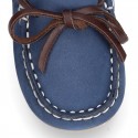 Nobuck leather Moccasin shoes with contraste bows for little kids.