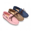 Nobuck leather Kids Moccasin shoes with contraste bows.