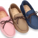 Nobuck leather Kids Moccasin shoes with contraste bows.