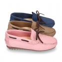 Nobuck leather Kids Moccasin shoes with contraste bows.