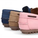 Nobuck leather Kids Moccasin shoes with contraste bows.