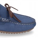 Nobuck leather Kids Moccasin shoes with contraste bows.