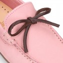 Nobuck leather Kids Moccasin shoes with contraste bows.