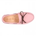 Nobuck leather Kids Moccasin shoes with contraste bows.