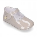 Patent leather Mary Janes for babies with button.