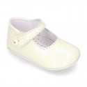 Patent leather Mary Janes for babies with button.