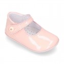 Patent leather Mary Janes for babies with button.