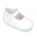 Patent leather Mary Janes for babies with button.