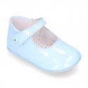 Patent leather Mary Janes for babies with button.