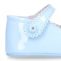 Patent leather Mary Janes for babies with button.