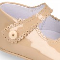 Patent leather Mary Janes for babies with button.