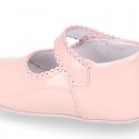 Patent leather Mary Janes for babies with button.