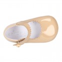 Patent leather Mary Janes for babies with button.