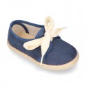 Spring summer canvas Laces up shoes espadrille style with ties closure.