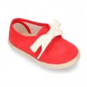 Spring summer canvas Laces up shoes espadrille style with ties closure.