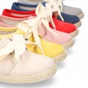 Spring summer canvas Laces up shoes espadrille style with ties closure.