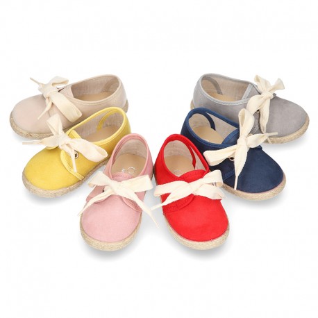 Spring summer canvas Laces up shoes espadrille style with ties closure.