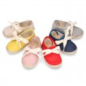 Spring summer canvas Laces up shoes espadrille style with ties closure.