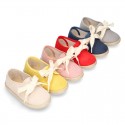 Spring summer canvas Laces up shoes espadrille style with ties closure.