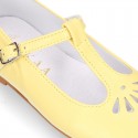 Nappa leather Little T-Strap OKAA Mary Jane shoes with perforated design in seasonal colors.