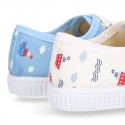 Cotton canvas Bamba type shoes with shoelaces and BOATS design.