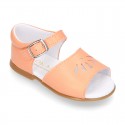 Nappa leather little Girl Sandal shoes with buckle fastening in seasonal colors.