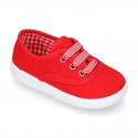 Cotton canvas sneaker bamba type shoes with VICHY laces design .