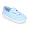 Cotton canvas sneaker bamba type shoes with VICHY laces design .