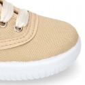 Cotton canvas sneaker bamba type shoes with VICHY laces design .