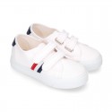 Cotton canvas kids tennis shoes to dress laceless with flag design.