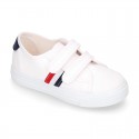 Cotton canvas kids tennis shoes to dress laceless with flag design.