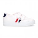 Cotton canvas kids tennis shoes to dress laceless with flag design.