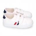 Cotton canvas kids tennis shoes to dress laceless with flag design.