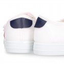 Cotton canvas kids tennis shoes to dress laceless with flag design.