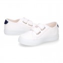 Cotton canvas kids tennis shoes to dress laceless with flag design.