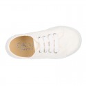 Zapatilla niñas en lona algodón en color blanco con BORDADOS.