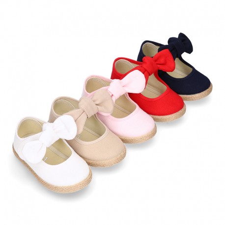 Cotton canvas espadrille shoes little Mary Jane style with hook and loop strap and bow.