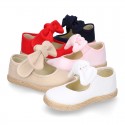 Cotton canvas espadrille shoes little Mary Jane style with hook and loop strap and bow.