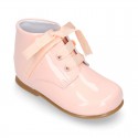 Classic patent leather ankle boots to dress with ties closure in PASTEL COLORS.