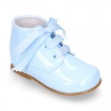 Classic patent leather ankle boots to dress with ties closure in PASTEL COLORS.