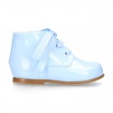 Classic patent leather ankle boots to dress with ties closure in PASTEL COLORS.