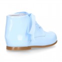 Classic patent leather ankle boots to dress with ties closure in PASTEL COLORS.