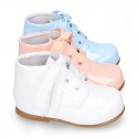 Classic patent leather ankle boots to dress with ties closure in PASTEL COLORS.