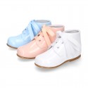 Classic patent leather ankle boots to dress with ties closure in PASTEL COLORS.