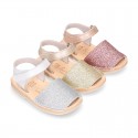 Shiny soft leather kids menorquina sandals with hook and loop strap.