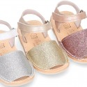 Shiny soft leather kids menorquina sandals with hook and loop strap.